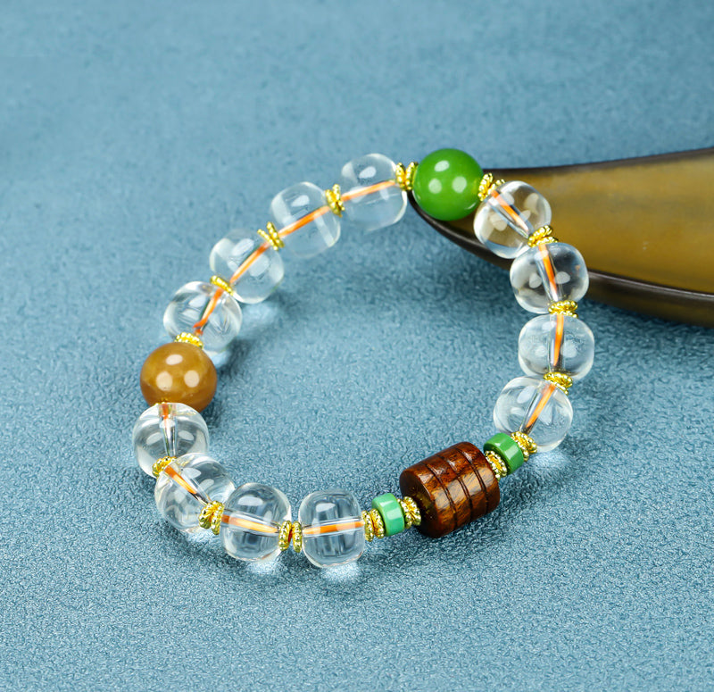Natural crystal, interspersed wood carvings, and agate beads embellished elastic bracelet – three colors complementing each other, rich in layers