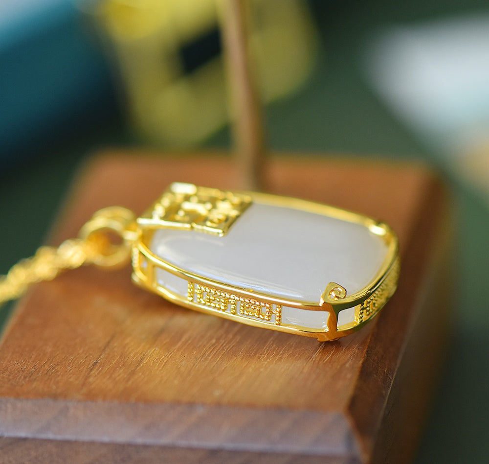 Hetian jade square gold-plated fretwork pendant necklace – with fine gold trim, featuring a classic, warm, and elegant Chinese style.