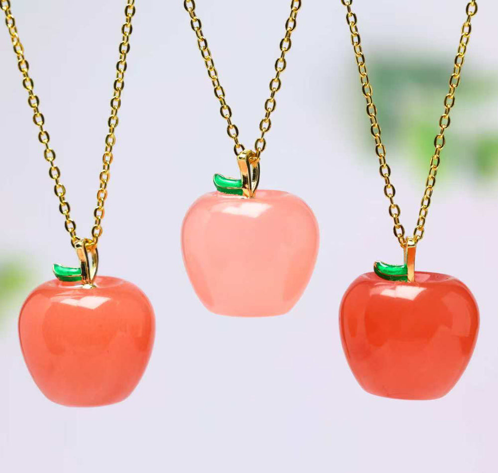 Red Agate Apple Pendant Necklace with Emerald-Green Leaf Clasp – Finely carved apple design symbolizing peace, safety, and a flourishing, vibrant life.