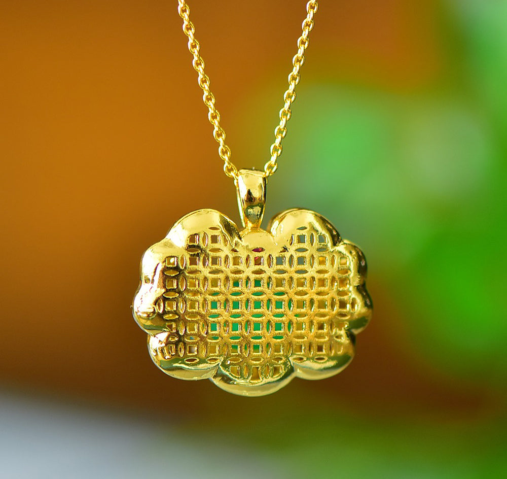 A Green Jade Necklace with Auspicious Cloud Mirror Design – Framed with Golden Auspicious Clouds and Adorned with Rubies