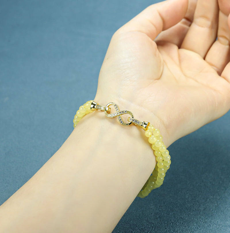 Yellow-green jadeite beaded bracelet with three rows of round beads, gold inlay, multi-bead combination, fresh and gentle.