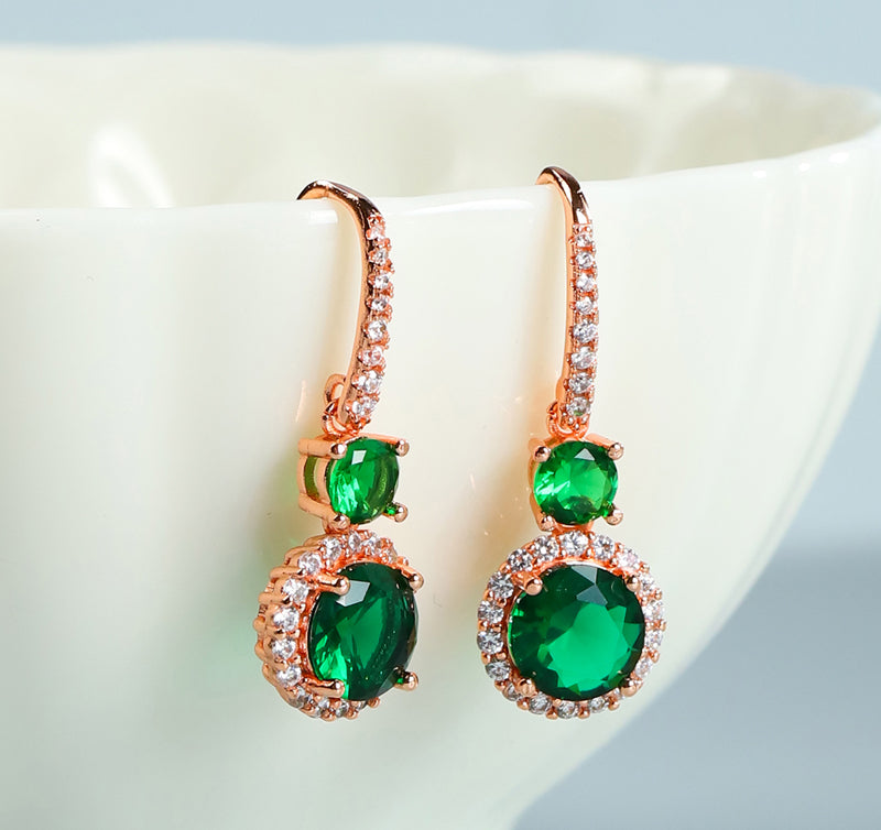 Emerald double crystal rose gold earrings, studs and drops, set with white vanadium, come in a beautiful gift box.