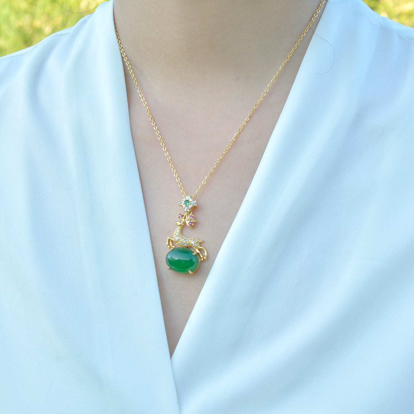 Deer-shaped emerald jade necklace – fully gilded golden deer antlers decorated with red and pink gemstones