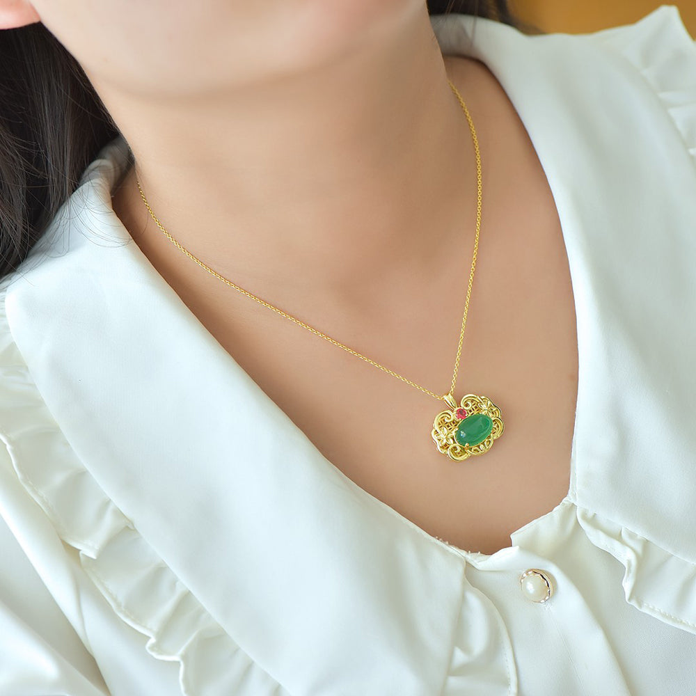 A Green Jade Necklace with Auspicious Cloud Mirror Design – Framed with Golden Auspicious Clouds and Adorned with Rubies