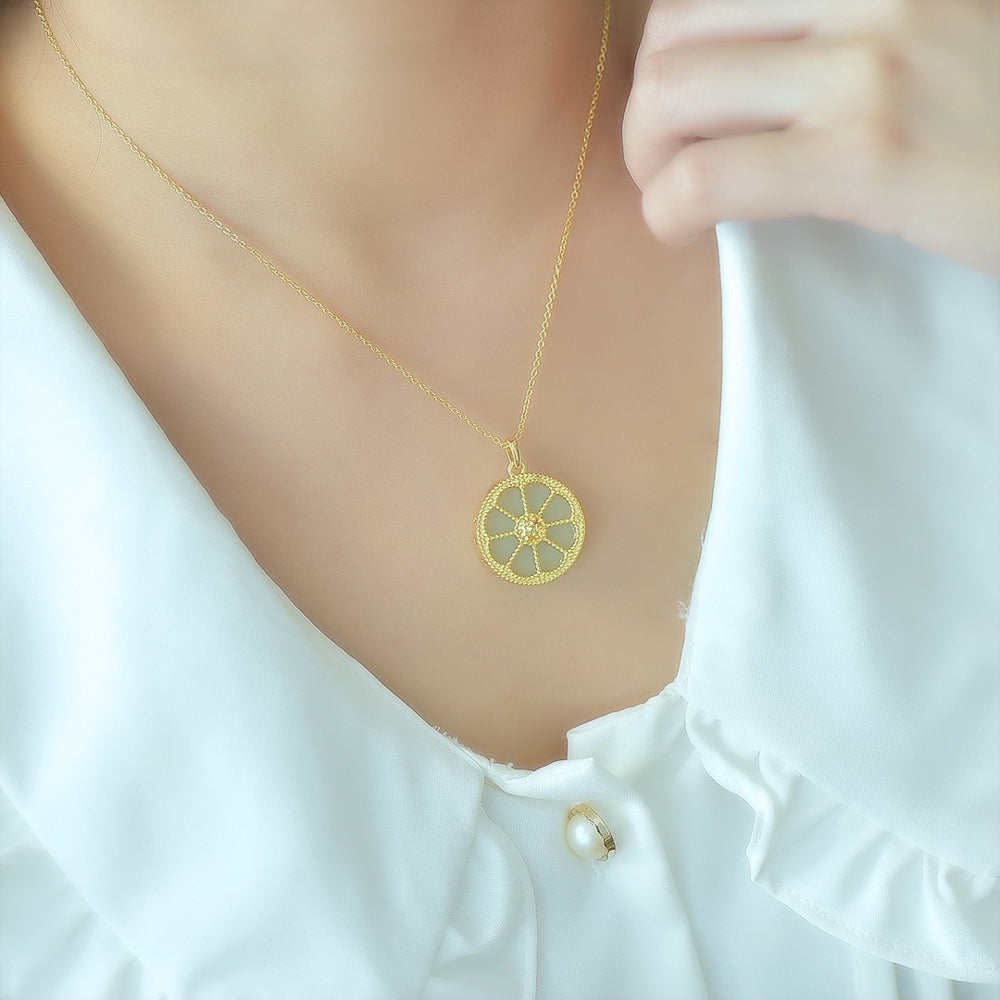 Round Dharma Wheel Necklace with Eight-Petaled Flower Hetian Jade Constructed with white jade segments separated by golden spokes