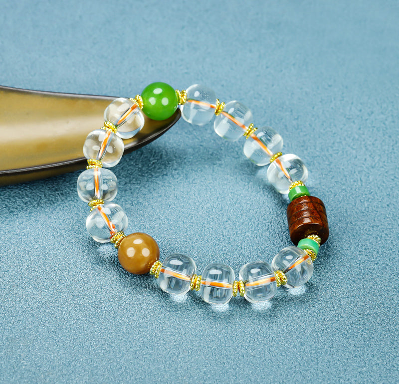 Natural crystal, interspersed wood carvings, and agate beads embellished elastic bracelet – three colors complementing each other, rich in layers