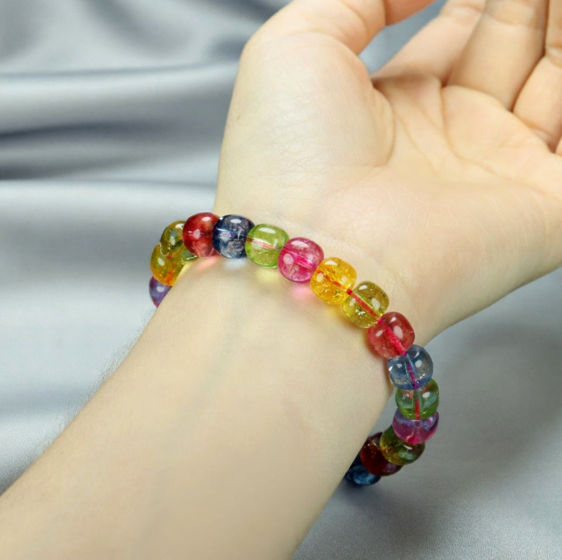 Multi-colored tourmaline barrel bead elastic bracelet - rose red, blue, olive green, yellow, purple, and other colors, crystal clear like rainbow candy.