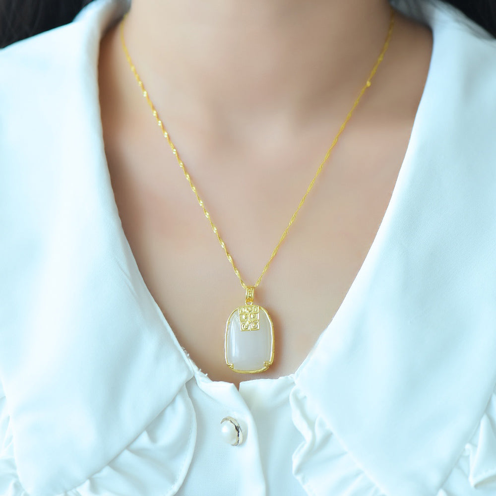 Hetian jade square gold-plated fretwork pendant necklace – with fine gold trim, featuring a classic, warm, and elegant Chinese style.