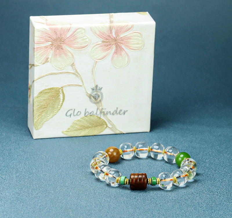 Natural crystal, interspersed wood carvings, and agate beads embellished elastic bracelet – three colors complementing each other, rich in layers