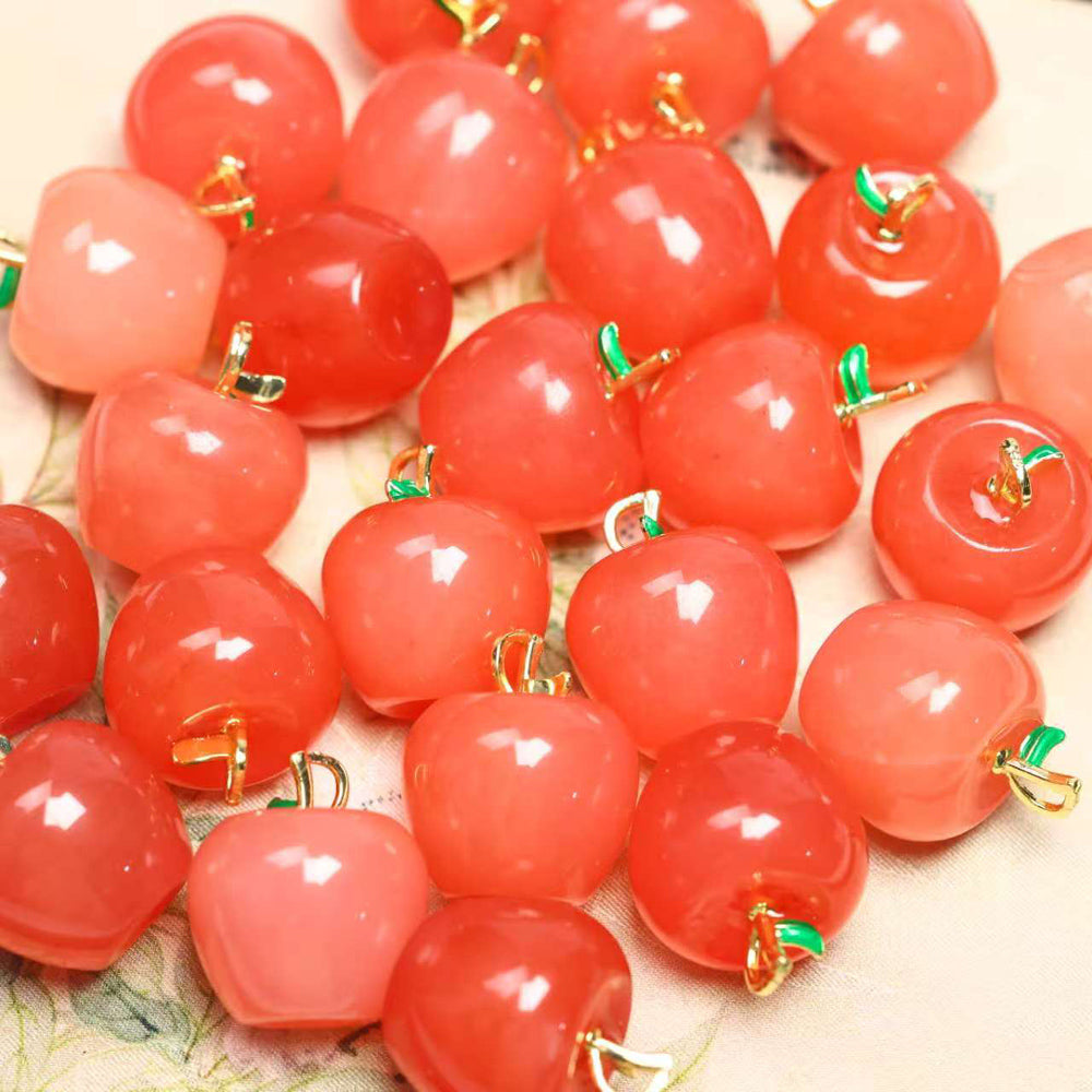 Red Agate Apple Pendant Necklace with Emerald-Green Leaf Clasp – Finely carved apple design symbolizing peace, safety, and a flourishing, vibrant life.