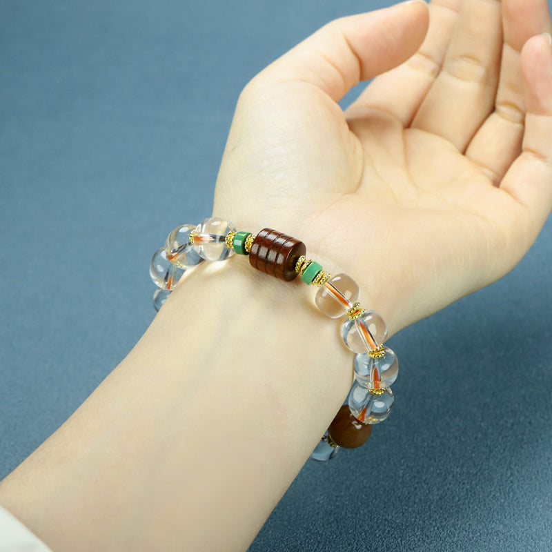 Natural crystal, interspersed wood carvings, and agate beads embellished elastic bracelet – three colors complementing each other, rich in layers