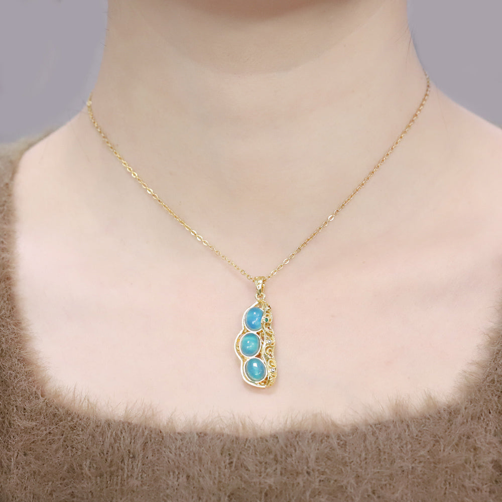Sky blue chalcedony pendant necklace with three round pea pod beads, clear, fresh, lively, creative, cute, and symbolizing many children and blessings.
